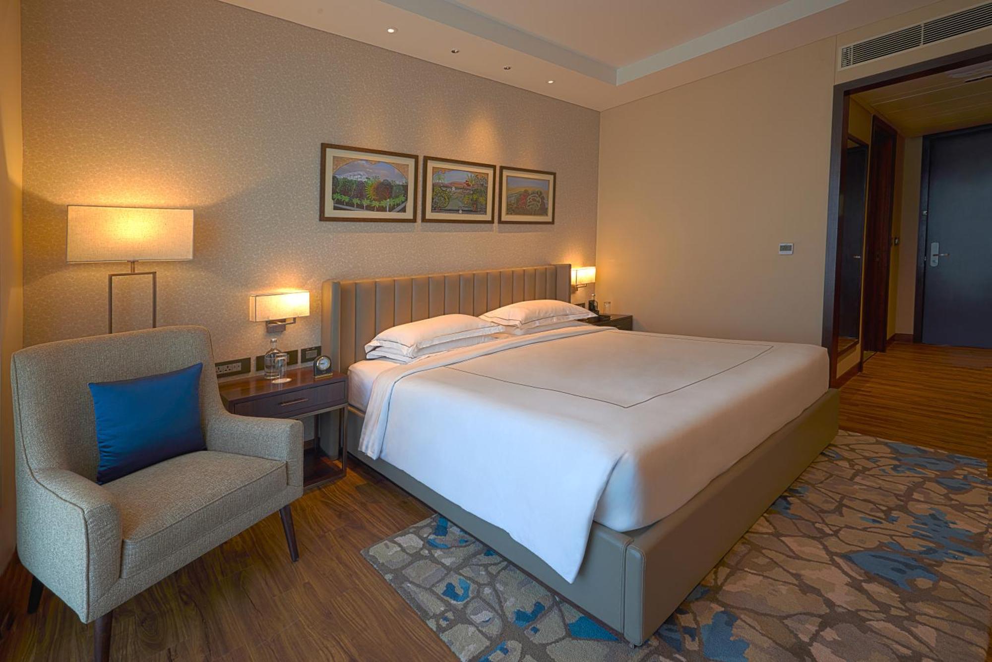 Taj Bangalore Devanahalli Dış mekan fotoğraf A bedroom at the hotel