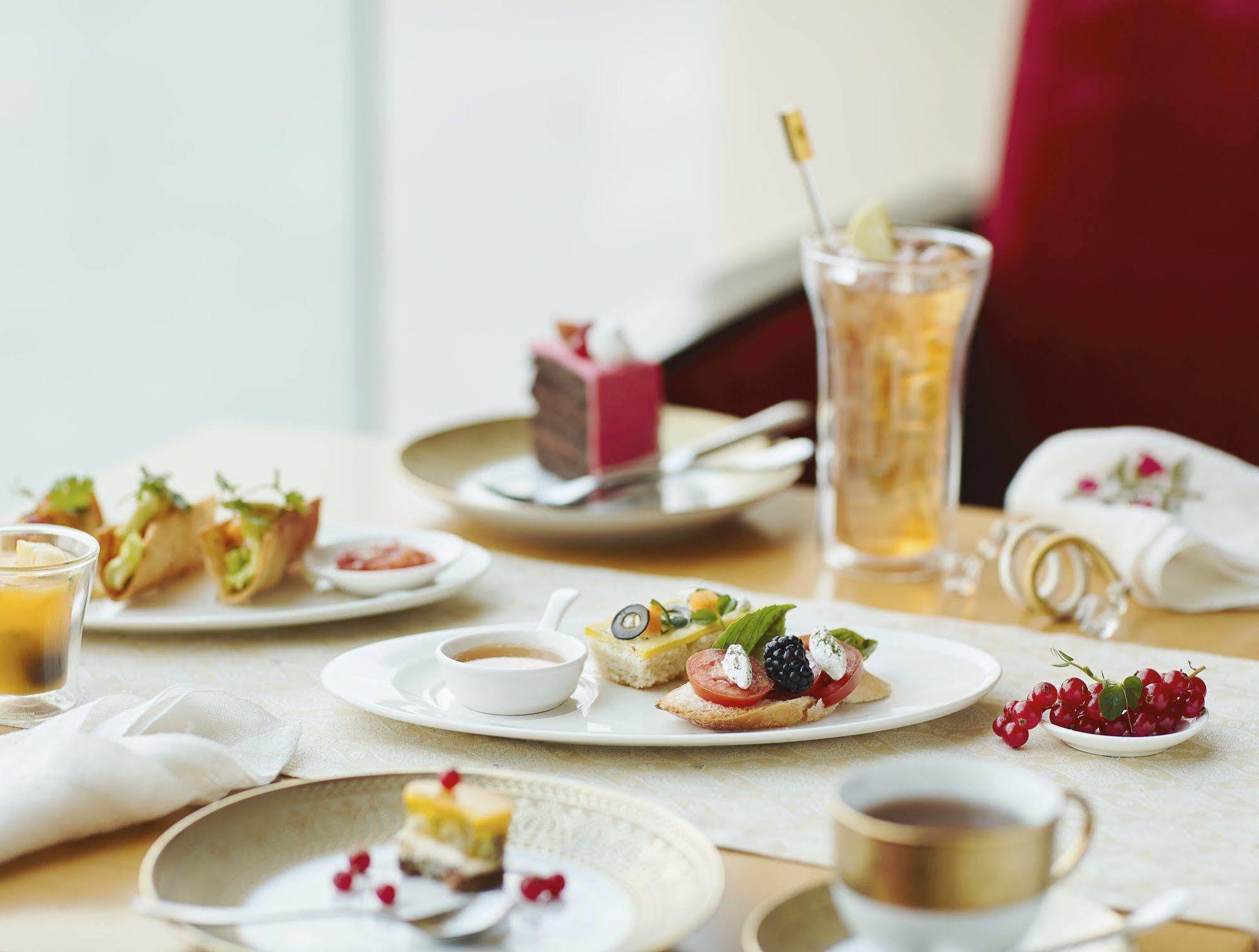 Taj Bangalore Devanahalli Dış mekan fotoğraf A typical afternoon tea